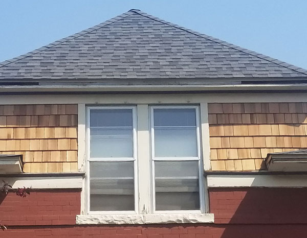 Siding replacement S Diligent Roofing Colorado With a new roof and new cedar shingle siding this home is back to its former beauty