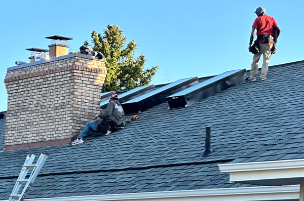 Skylights flashed and reinstalled S Diligent Roofing Colorado Final touches on the new skylight replacements and evacuated fireplace after the roof has been installed