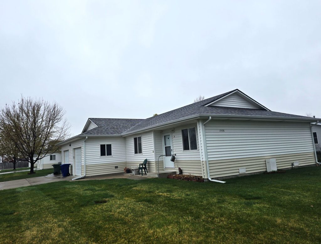 rental townhome community reroofing H Diligent Roofing Colorado Eastern Colorado townhome complex roof and siding replacement completed